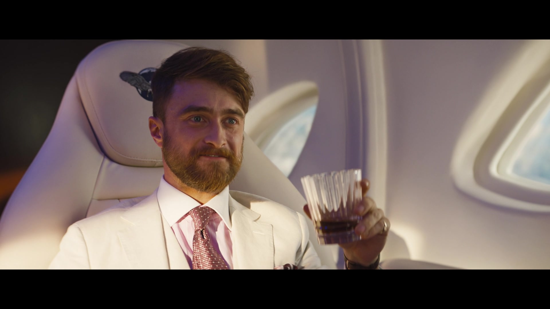 Radcliffe in a private jet