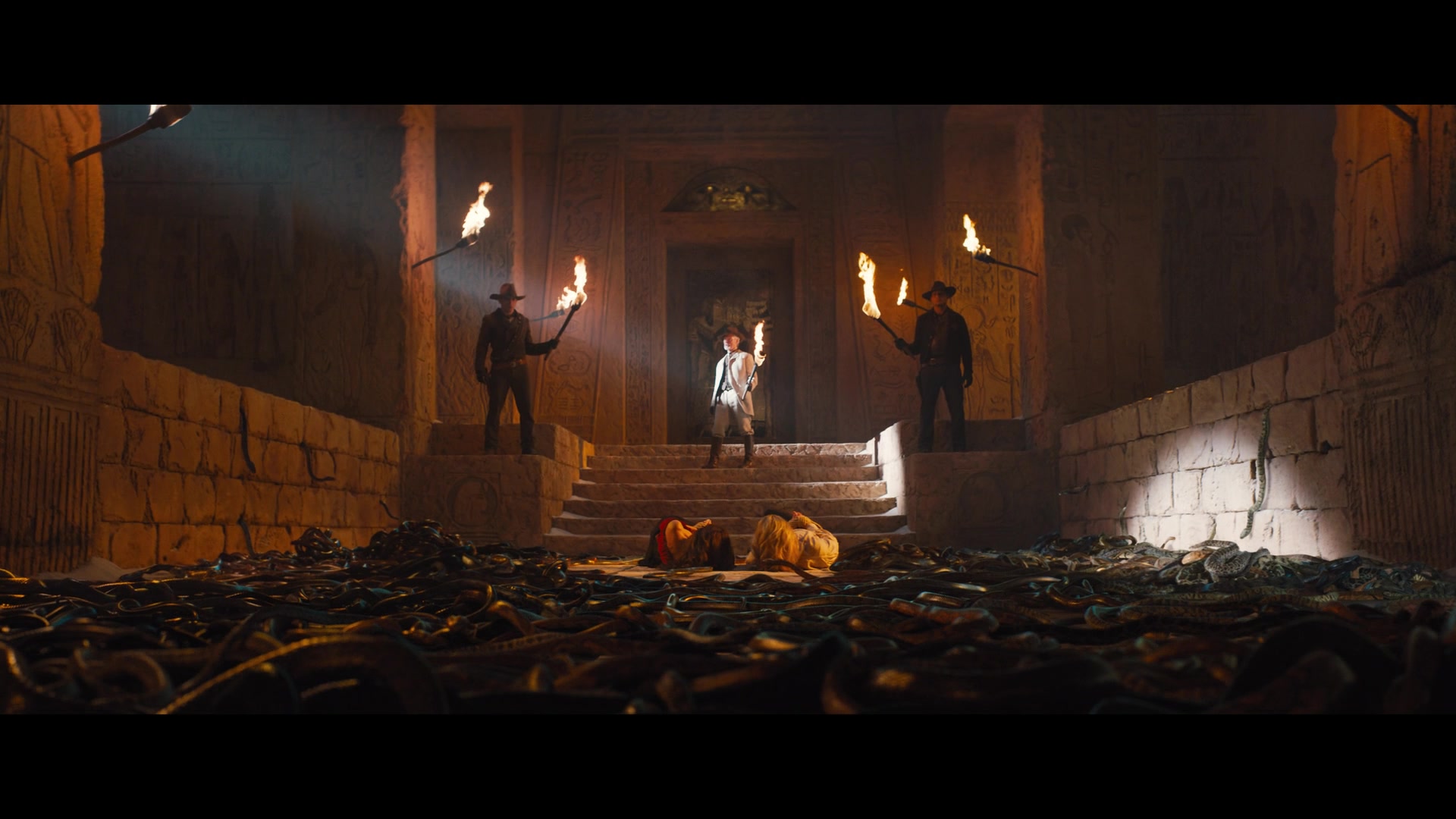 The heroes awake in a pit of snakes