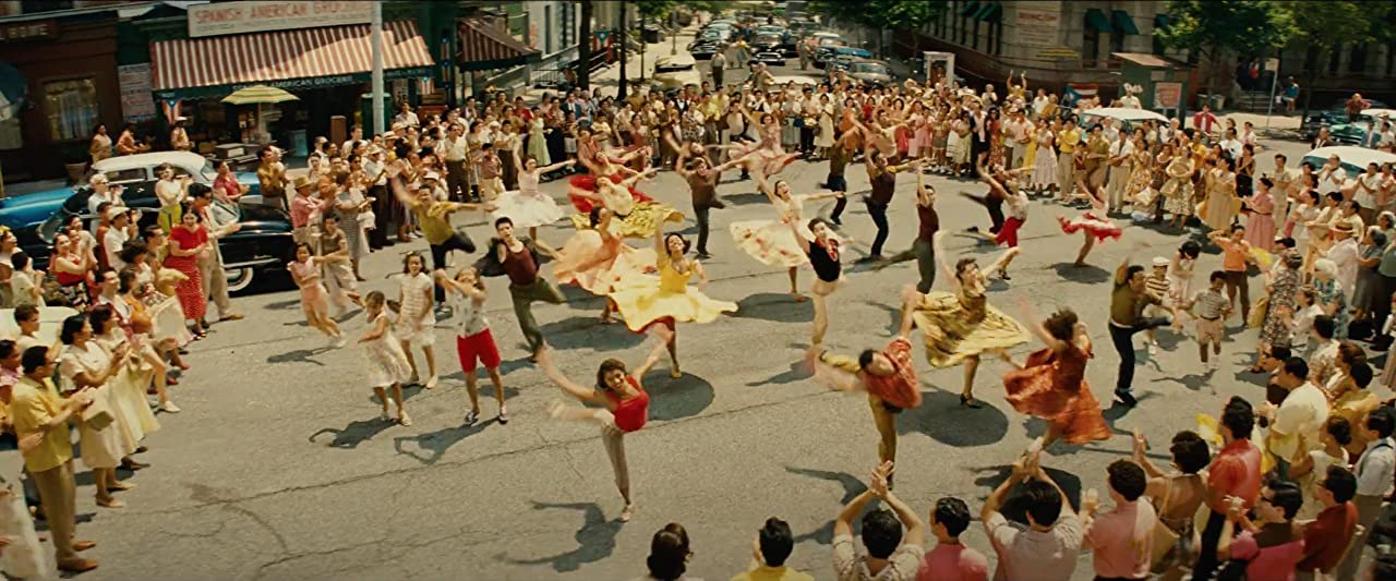 A group of people dancing in the street